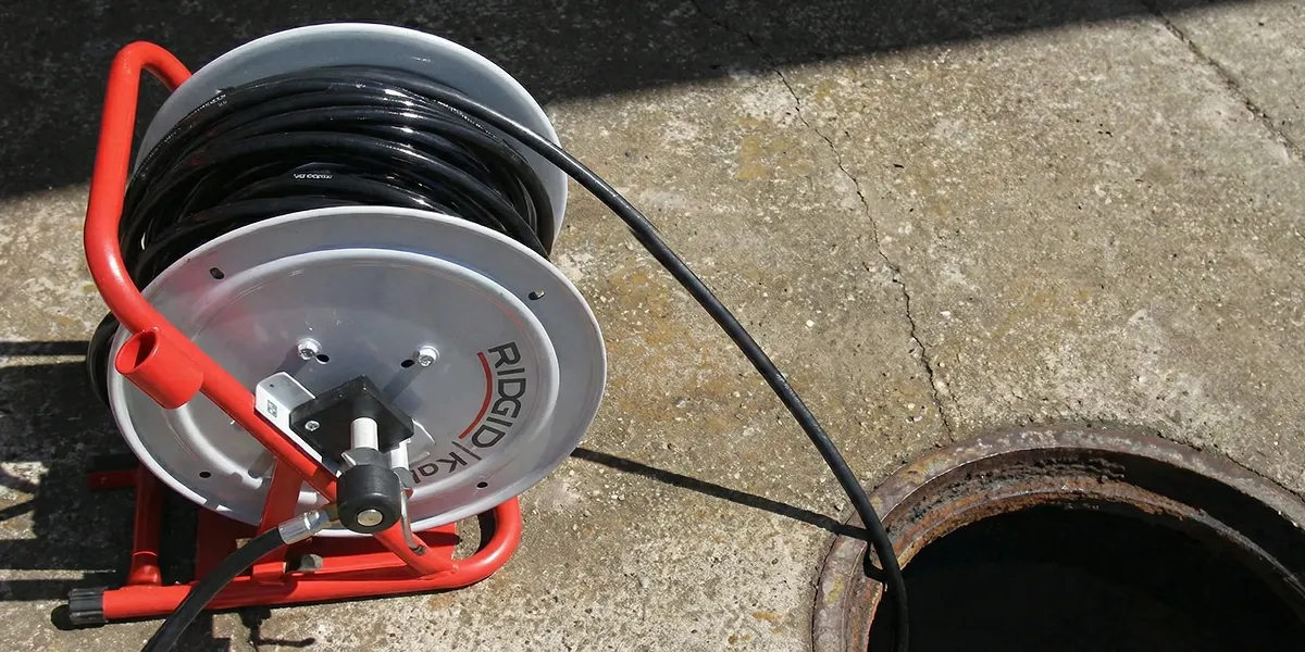sewer rodding equipment prepared to clear clogged sewer lines in Pasadena, CA