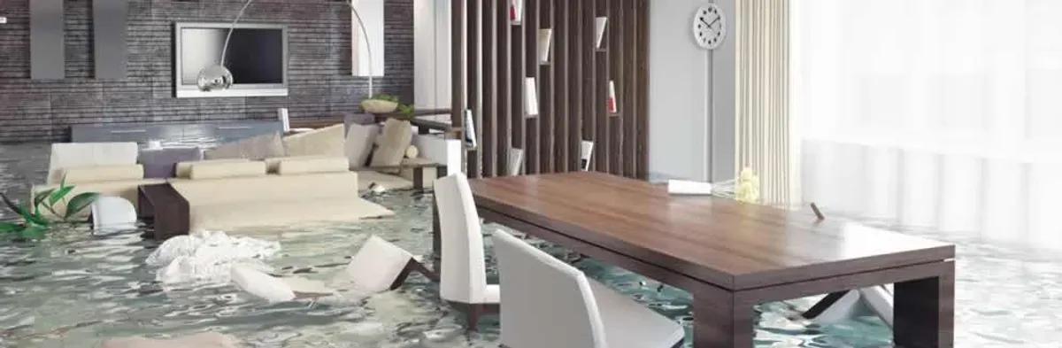 home interior affected by water damage with flooded floors and displaced furniture in Pasadena, CA